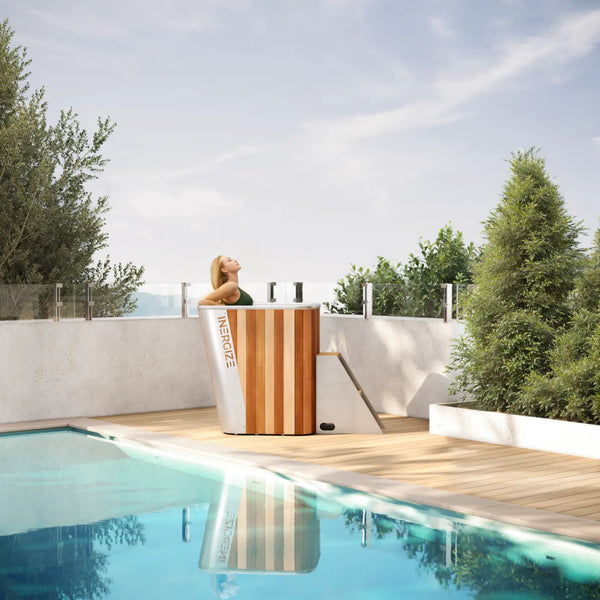 Inergize Spire Elite cold plunge in cedar and stainless steel, installed poolside